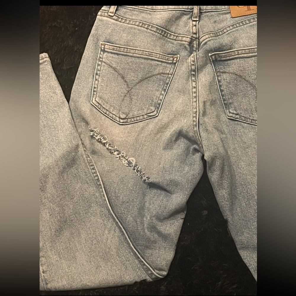 Lightwash Calvin Klein Jeans with Butt Scuff